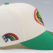 UNIVERSITY OF HAWAI'I RAINBOW WARRIORS OFF WHITE LUSH GREEN NEW ERA FITTED CAP