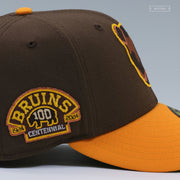 BOSTON BRUINS 1924-2024 CENTENNIAL MAHOGANY YUKON GOLD NEW ERA FITTED CAP