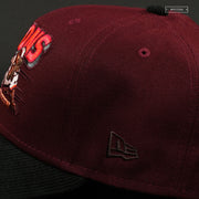 BUFFALO BISONS SLIDING BISON INTENSE MAROON AND INFRARED BLISS NEW ERA FITTED CAP